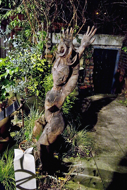 Wooden woman sculpture